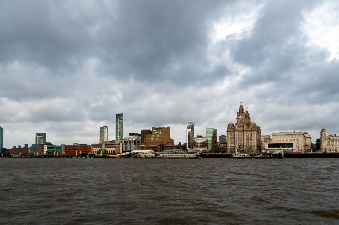 Liverpool skyline, the royal liver building and river on a dark day.